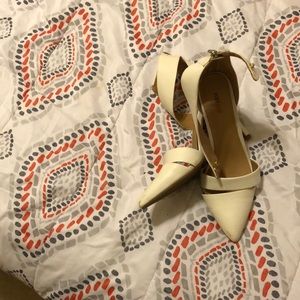 Beige closed heel shoe